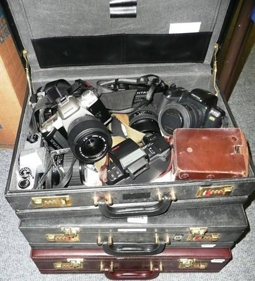 Lot 1174 - A Large Collection of 35mm Cameras, including a Canon-A1, Centon DF-300, Canon T70, Pentax...