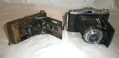 Lot 1180 - Two Folding Rollfilm Cameras:- Ensign Carbine Tropical, Model No.4, with bronzed brass body (worn)