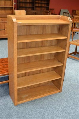 Lot 843 - A Robert  "Mouseman " Thompson Oak 4' Open Bookcase, with raised upstand, solid ends and...