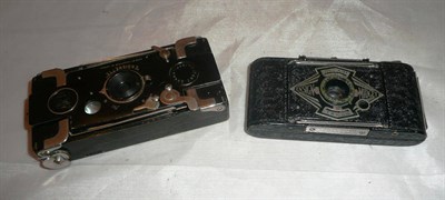 Lot 1191 - Two Houghton Ensign Miniature Cameras - Ensign Midget Model 55, with black crinkle enamel body...