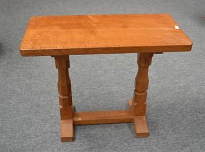 Lot 844 - A Robert  "Mouseman " Thompson Oak Extension Table, on two octagonal legs joined by a stretcher...