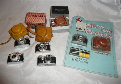 Lot 1199 - Seven Subminiature Cameras - Kiku 16 Model II by Morita Trading Co., in leather case, Minetta...