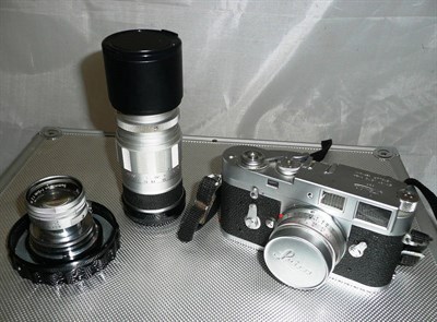 Lot 1205 - A Leica M2 Camera Outfit, with chrome camera body, serial number 1020254, self timer, button...