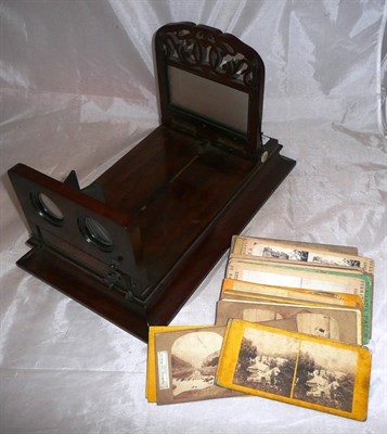 Lot 1212 - A Late 19th Century Walnut Graphoscope Stereo Viewer, with twin lenses, fretwork decoration to...