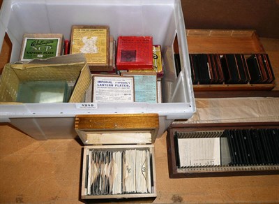 Lot 1215 - Two Boxes of Magic Lantern Slides, all 8cm by 8cm, including copper framed slides by J.Moore,...