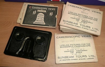 Lot 1226 - A Small Folding Metal Stereo Viewer, together with ten boxed sets of Camerascopic Views by...