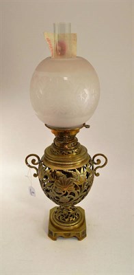 Lot 6 - A brass oil lamp