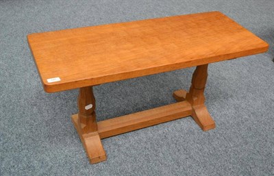 Lot 848 - A Robert  "Mouseman " Thompson Oak 3' Rectangular Coffee Table, on two octagonal legs, joined...