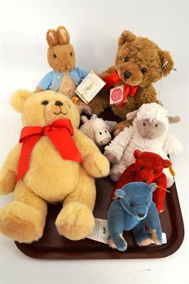 Lot 10 - Blonde Steiff Teddy bear; small jointed Steiff bear in red; another in blue; a Hermann Teddy...