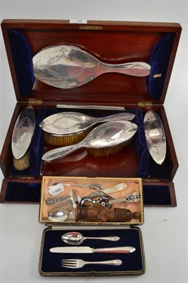 Lot 39 - A silver brush set in mahogany box, locked, a silver Christening set, cased, a spoon and pusher and