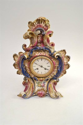 Lot 47 - A French pottery mantel clock and pendulum