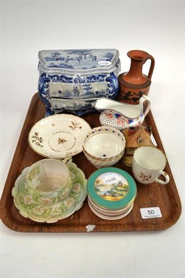 Lot 50 - A miniature delft commode, tea bowls, milk jug, etc