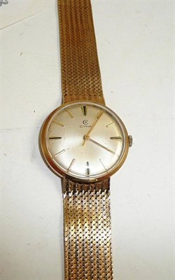 Lot 64 - A 9ct gold gentleman's 'Cyma' watch and strap
