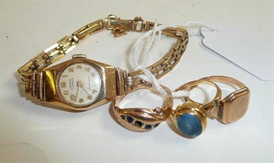 Lot 69 - A 9ct gold lady's wristwatch and three rings