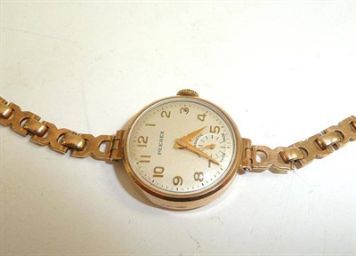 Lot 82 - A lady's 9ct gold wristwatch, Peerex