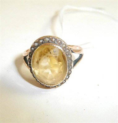 Lot 89 - A citrine and seed pearl cluster ring