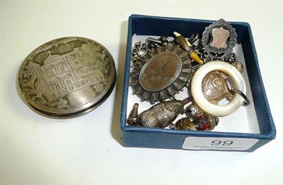 Lot 99 - Silver child's rattle and teether 'Boy blue', a silver chain, locket, an owl pencil, a compact...