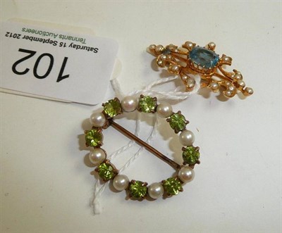 Lot 102 - A peridot and cultured pearl oval brooch stamped ";9ct"; and an early 20th century seed pearl...