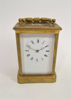 Lot 114 - A brass carriage clock