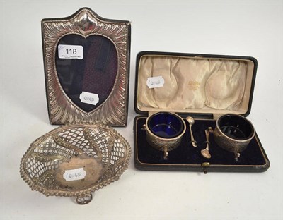 Lot 118 - Silver photograph frame, cased pair of silver salts and a white metal dish