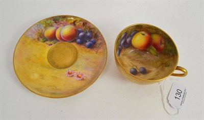 Lot 130 - Royal Worcester fruit painted cup and saucer, cup painted by F.Harper and the saucer painted...