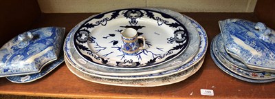 Lot 140 - Pair of blue and white shaped tureens and covers, blue and white pottery meat dish, three...