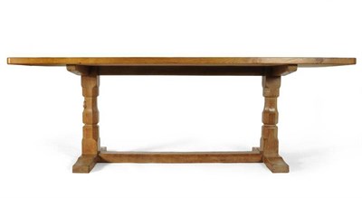 Lot 864 - A Robert  "Mouseman " Thompson 7' Four Plank Oak Refectory Table, on two octagonal turned legs,...