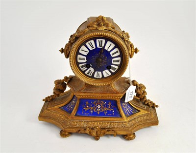 Lot 177 - Gilt metal mounted mantel clock with pottery mounts