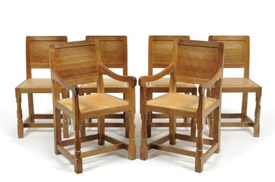 Lot 865 - A Set of Six (4+2) Robert  "Mouseman " Thompson Oak Panel Back Chairs, on turned octagonal...