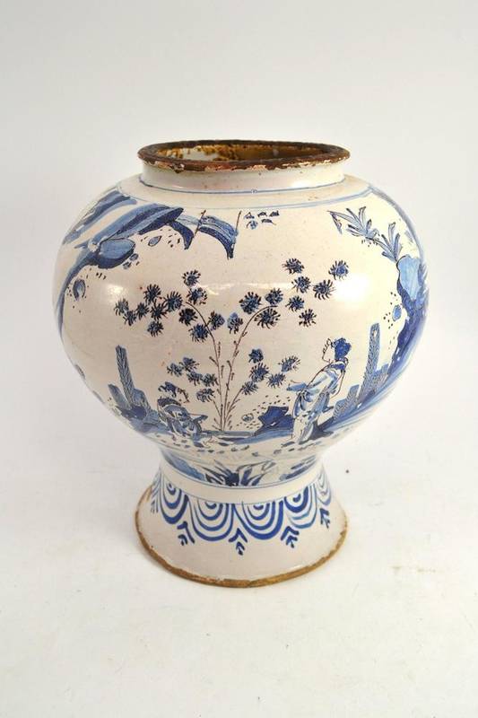 Lot 184 - An 18th century tin glaze blue and white decorated jar