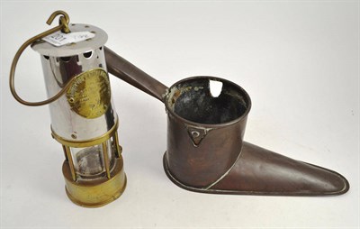 Lot 201 - An Eccles miner's lamp and an 18th century ale muller