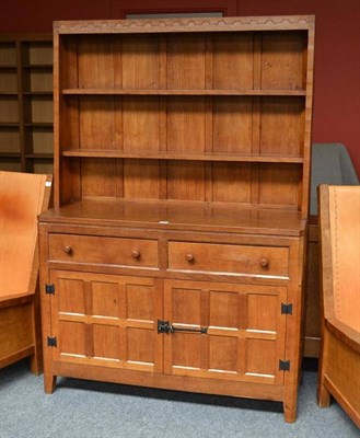 Lot 868 - A Peter  "Rabbitman " Heap 4' Oak Dresser, the rack with two shelves, the base with two drawers...