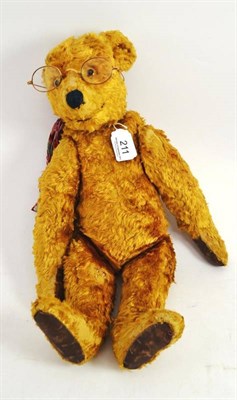 Lot 211 - A Continental teddy bear with gold mercerised cotton fur and a pair of spectacles