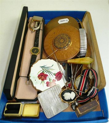 Lot 215 - Assorted watches, compacts, a dress ring, two acorn-style hat pins, etc