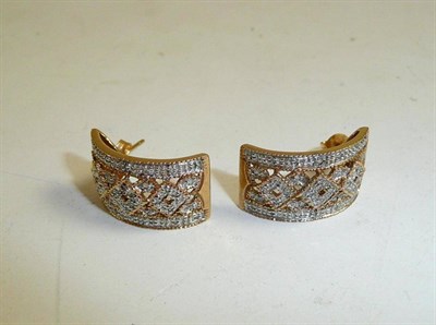 Lot 218 - A pair of 9ct gold diamond set earrings