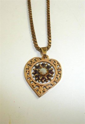 Lot 224 - A 9ct gold opal and garnet heart shaped pendant on a long length box chain