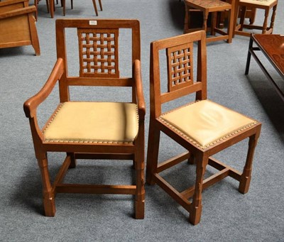 Lot 870 - A Set of Eight (6+2) Peter  "Rabbitman " Heap Oak Lattice Back Dining Chairs, with cream hide...