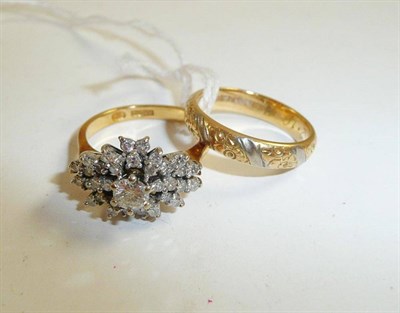 Lot 237 - A diamond cluster ring and a gold band