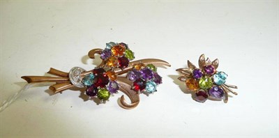 Lot 241 - A 9ct gold multi gemstone floral brooch and one earring