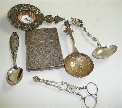 Lot 242 - Filigree card case and cover, pair of silver sugar nips and four Continental spoons