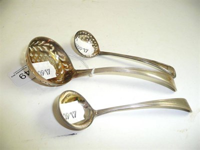 Lot 249 - Pair of small silver pierced ladle and one larger ladle