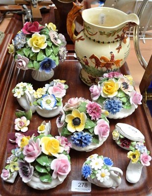 Lot 278 - Fielding's John Peel musical jug and fourteen flower encrusted ornaments