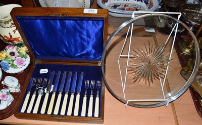 Lot 281 - Six plated dessert knives and forks in box and glass circular tray with silver plated rim