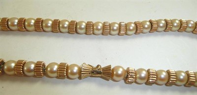 Lot 317 - A cultured pearl and 9ct gold necklace