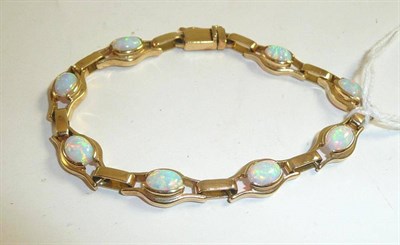 Lot 321 - An opal bracelet stamped '585'