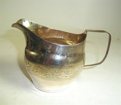 Lot 327 - A Georgian silver cream jug, various repairs