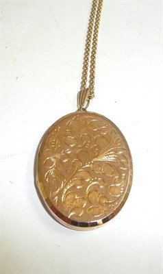 Lot 332 - A 9ct gold locket on a 9ct gold belcher chain