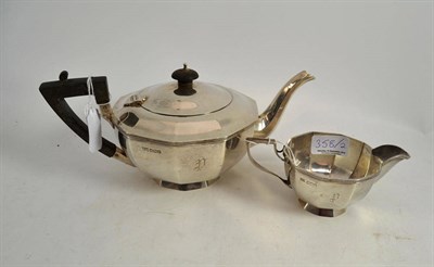 Lot 358 - Walker & Hall silver teapot initialled 'P' and a milk jug (2)