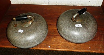 Lot 381 - A pair of curling stones