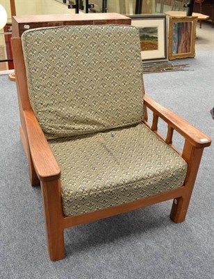 Lot 886 - A Horace  "Knightman " Knight Oak Armchair, with lattice back and side panels, slatted base...